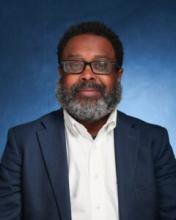 Prof. Glake Hill Headshot